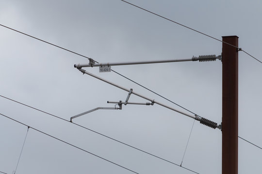 Overhead live electric railway train power supply
