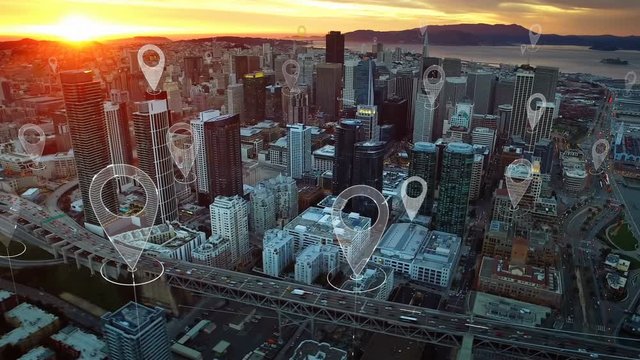 Aerial smart city. Localization icons in a connected futuristic city.  Technology concept, data communication, artificial intelligence, internet of things. San Francisco skyline.
