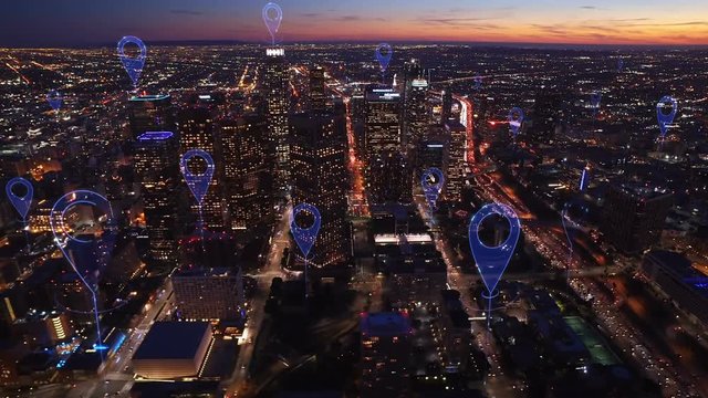 Aerial smart city. Localization icons in a connected futuristic city.  Technology concept, data communication, artificial intelligence, internet of things. Los Angeles skyline.