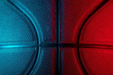 Deurstickers Closeup detail of basketball ball texture background. Blue neon Banner Art concept © Augustas Cetkauskas
