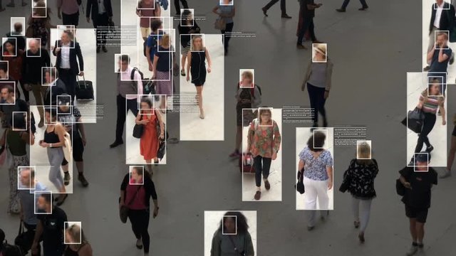 High view of commuters walking. Facial recognition interface showing personal data for each person. Surveillance concept. Artificial intelligence. Deep learning.