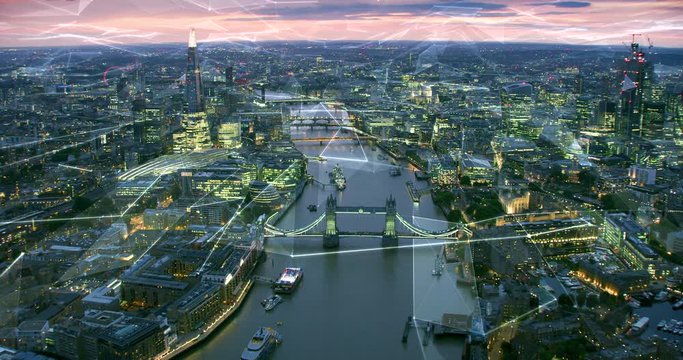 Aerial view of London Skyline with connections. Technology-Futuristic. High tech view of the financial district connected through a network. Internet of Things. Artificial intelligence.