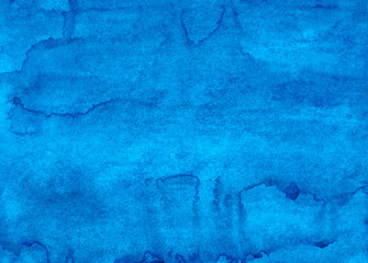 Watercolor deep blue liquid background painting texture. Hand painted watercolour backdrop. Sky blue stains on paper. Elegant overlay.