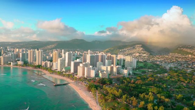 Honolulu skyline. Aerial view of Waikiki beach,  Ala Wai canal and Kapi olani Regional Park. Oahu is the third largest Hawaiian island. United States.