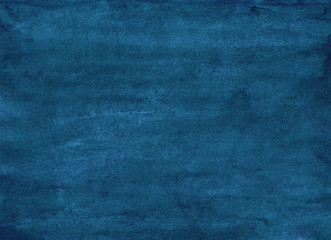 Watercolor ink blue background texture, stains on paper. Hand painted dark blue rough watercolour backdrop.