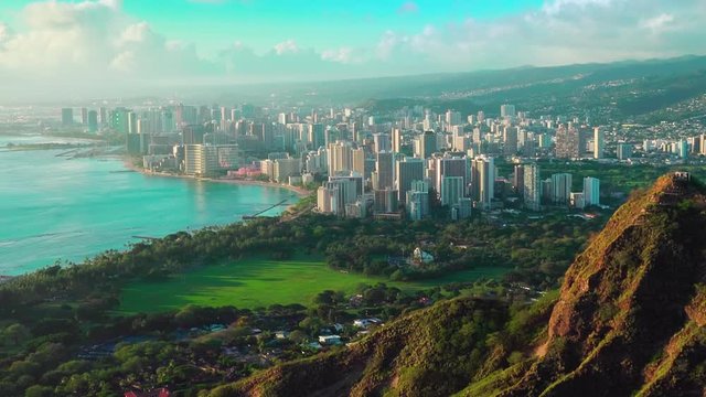 Aerial view of Diamond Head Crater with Honolulu skyline in the background. Oahu island, Hawaii. United States.