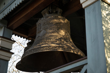 Obraz premium Ancient church tower bell close up