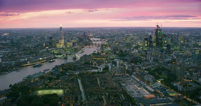 Aerial view of London famous landmarks.The city financial district with its modern skyscrapers. Famous bridges and buildings. Thames River. England. UK.