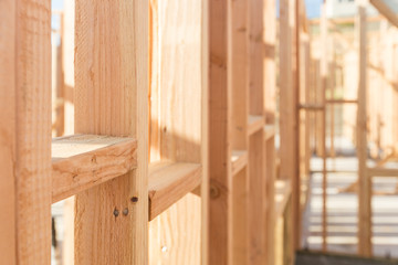 Fototapeta na wymiar Wood Home Framing Abstract At Construction Site