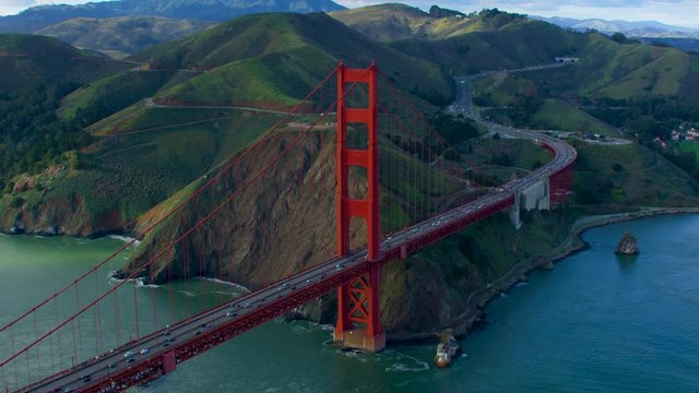 Aerial view of the Golden Gate Bridge. San Francisco, US. With the hilly Marin Headlands in the background. It connects the San Francisco Bay to Marin County. Shot on RED  weapon 8K.