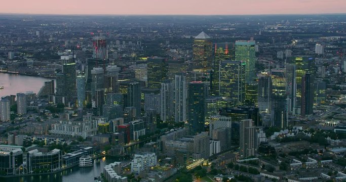 Aerial view of Canary Wharf skyline. Londons financial district with its modern skyscrapers. Millwall Inner Dock. River Thames. Modern high rise buildings. England. UK.