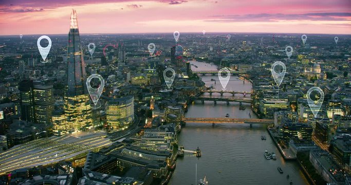 Aerial view of a smart and futuristic city. Famous bridges and buildings. Localization icons over London. Perfect to illustrate concepts as: data communication, artificial intelligence, IOT.