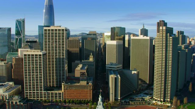 Aerial view of Market street and several skyscrapers. Financial District. Ferry building with its famous clock tower. Shot on Red weapon 8K. California, United States. Shot on Red weapon 8K. 
