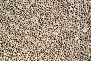 Granules of mineral fertilizer close-up.