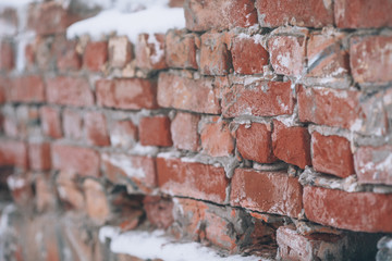 Old brick wall, side view. Brickwork of red bricks, background with copy-space