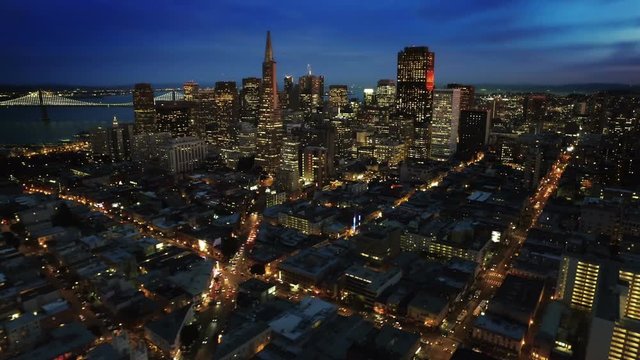 San Francisco skyline. Financial District at dusk. Aerial view. California, United States. Shot from helicopter.
