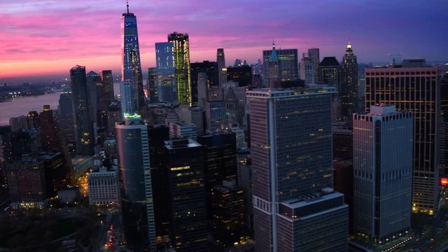 Famous skyscrapers during sunset in the Financial District of New York City. Lower Manhattan skyline, United States, North America. Shot from helicopter. 