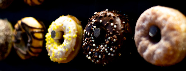chocolate donut on black background
