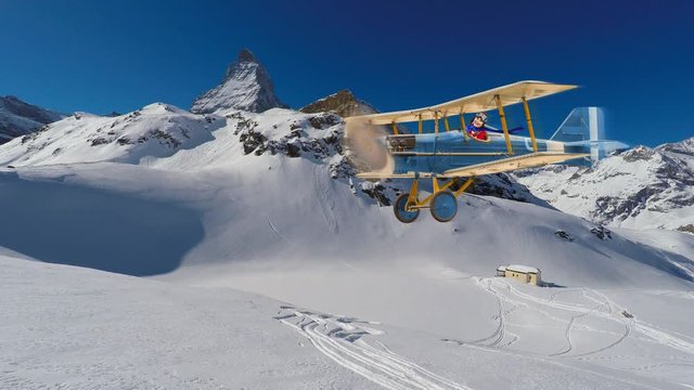 Child girl pilot aviator in airplane flying over winter mountains. The travel for ski by air concept.