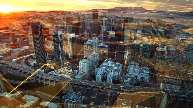 Connected San Francisco skyline. Financial District at dusk. Aerial view. California, United States. Futuristic network. Technology. Shot from a helicopter.