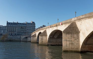 Pont Royal, the third oldest bridge in Paris, crossing Seine river, romantic landmark and tourist attraction.