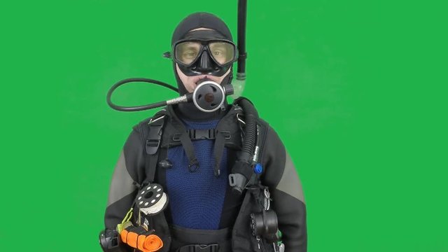 Scuba diving instructor shows signal &ndash; swimming