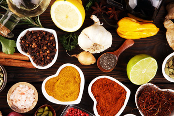 Spices and herbs on table. Food and cuisine ingredients with oil and vinegar