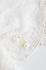 White pearl vintage style earring on lace 