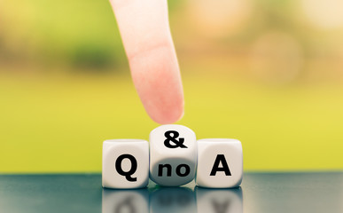 Hand turns a dice and changes the expression 