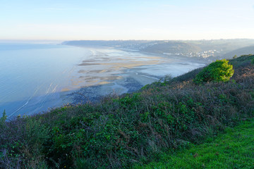 View of the Atlantic Ocean in the Baie de Saint Brieuc at low tide from the Pointe de Pordic in Cotes d&rsquo;Armor, Brittany, France