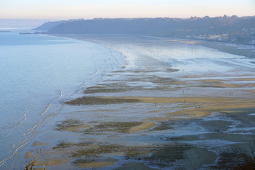 View of the Atlantic Ocean in the Baie de Saint Brieuc at low tide from the Pointe de Pordic in Cotes d’Armor, Brittany, France