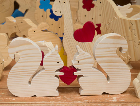 Naklejki Many new funny wooden animal toysand red hearts, Romania