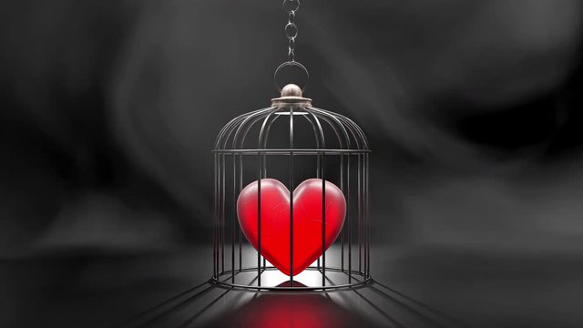 Broken heart is locked in a cage Under the fog and darkness . The concept of love and restraint. 3d render.