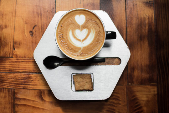 Delicious hot coffee with latte art