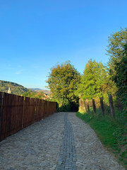 Fototapeta premium Brick road on countryside