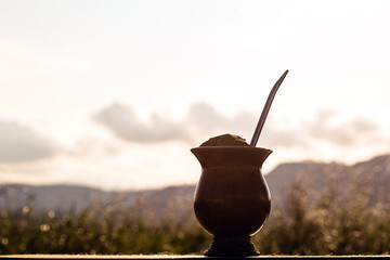 Gaucho yerba mate tea, the chimarão, typical brazilian drink, traditionally in a cuiade bombilla...