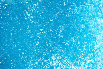 Fototapeta na wymiar Underwater Near Ocean Surface with Rising Bubbles in Blue Sea
