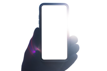 Close-up of smartphone with mockup in male hand dressed with black glove, isolated on white background with sunlight effect.