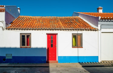 beautiful white and blue houses in traditional Portuguese design 