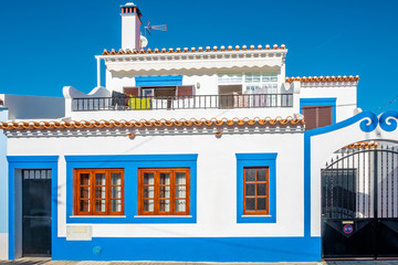 beautiful white and blue houses in traditional Portuguese design 