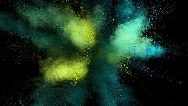 Super Slowmotion Shot of Color Powder Explosion Isolated on Black Background at 1000fps.