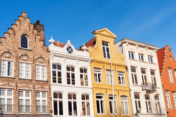 Fototapeta na wymiar Colorful old merchant houses in historic center of Bruges, Belgium