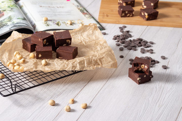 Delicious fudge with homemade chocolate and nuts