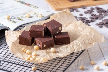 Delicious fudge with homemade chocolate and nuts