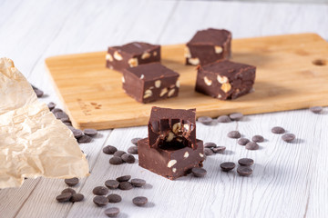Delicious fudge with homemade chocolate and nuts