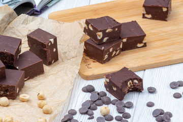 Delicious fudge with homemade chocolate and nuts