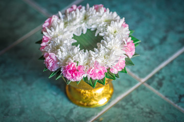 Close-up view of various flowers and roses arranged in vases for use in ceremonies (weddings, valentines, new years, visiting patients), light blurring, beauty Spectator