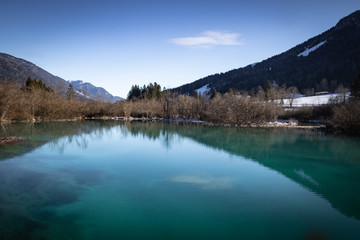 Obraz na płótnie Canvas scenic view on river source lake zelenci, slovenia