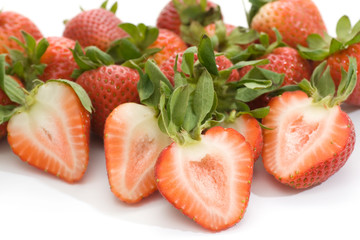 pile of strawberries whole and halves