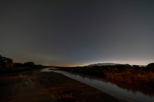 Night view of the Rio Grande river with a starry sky